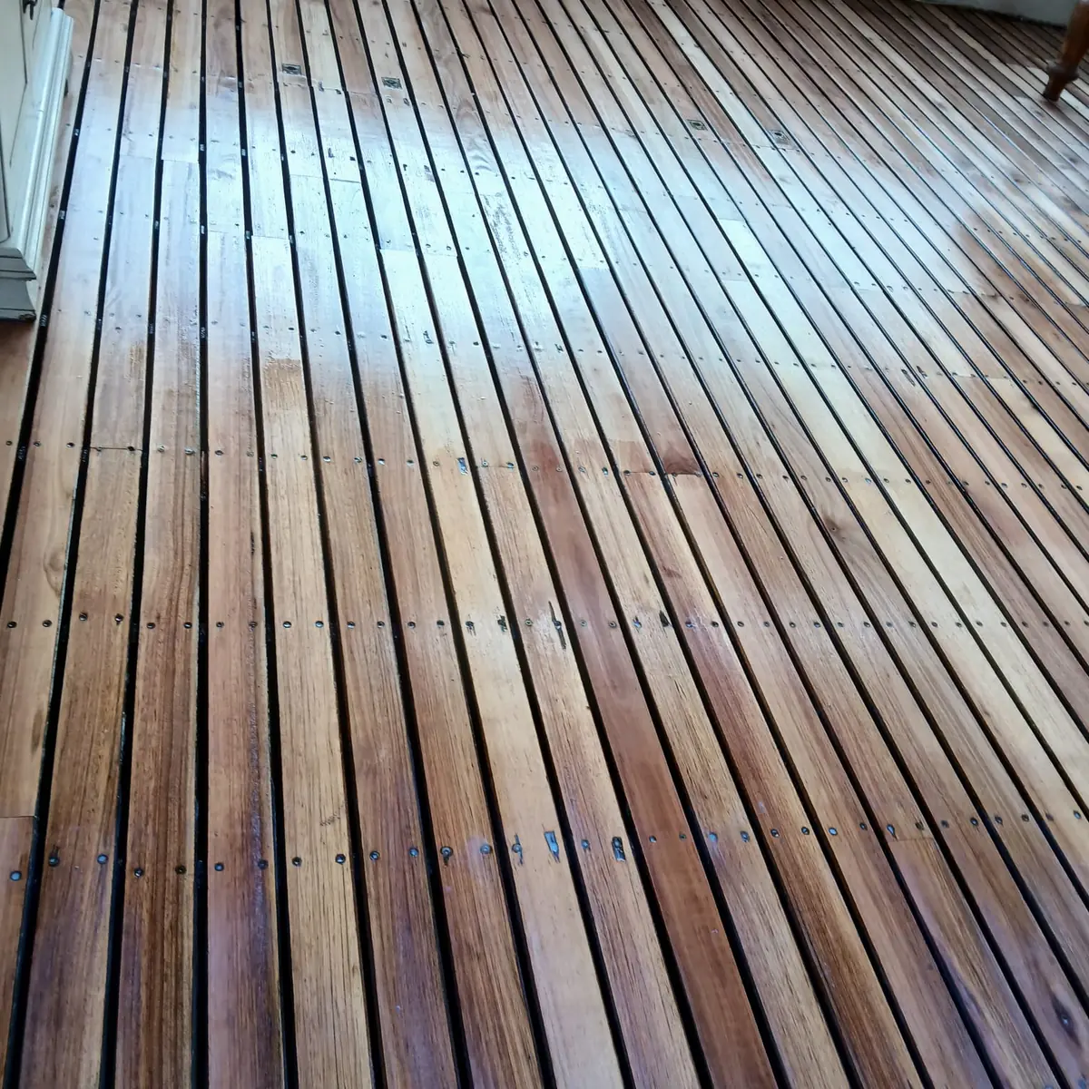 Hardwood decking boards with even spacing and countersunk fixings, Gauteng