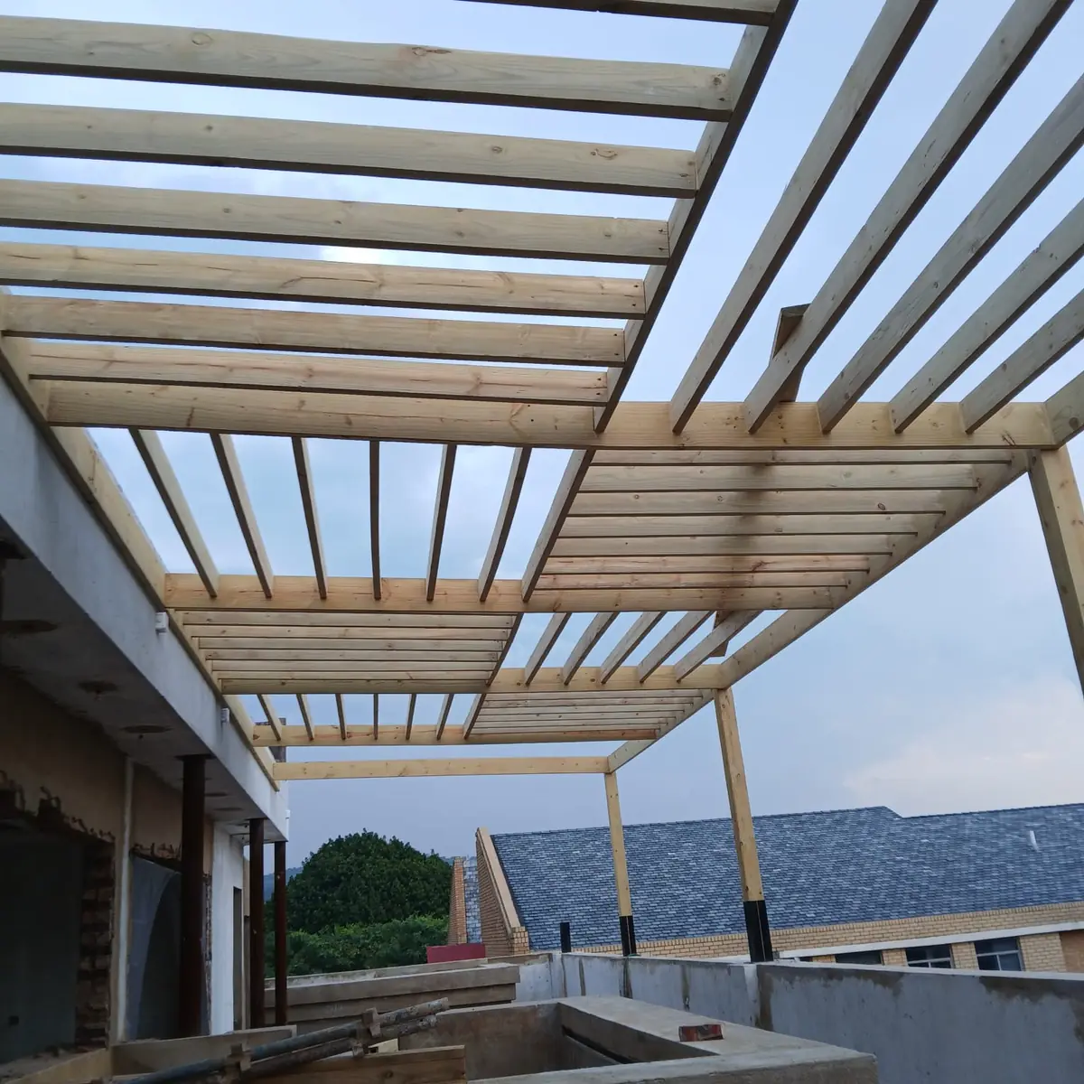 Timber frame under construction on a Gauteng site before cladding