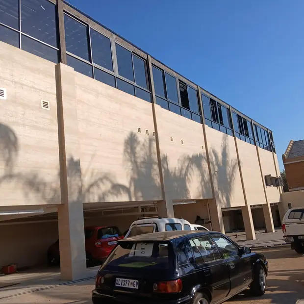 Timber cladding fitted to a commercial building facade in Midrand by Impi Teak