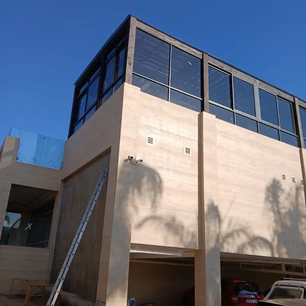 Timber-clad upper facade and glazing on a Pretoria commercial building by Impi Teak